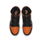 Top view of Air Jordan 1 Retro High Shattered Backboard 3.0 GS sneakers, featuring black and orange color scheme.