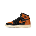 Jordan 1 Retro High Shattered Backboard 3.0 GS youth sneaker in black and orange colorway.