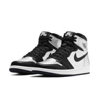 Jordan 1 Retro High Silver Toe (W) featuring black, silver, and white colorway for a stylish sneaker look.