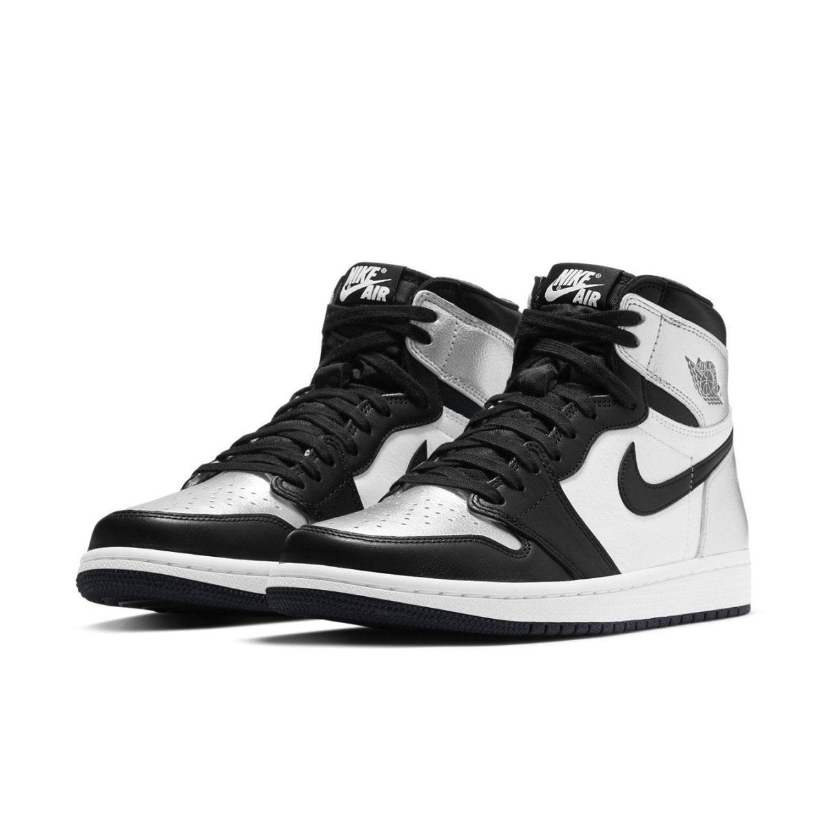 Jordan 1 Retro High Silver Toe (W) featuring black, silver, and white colorway for a stylish sneaker look.