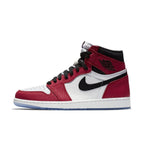 Jordan 1 Retro High Spider-Man Origin Story in red, black, and white with reflective details and dotted patterns.
