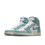 Air Jordan 1 Retro High Turbo Green featuring suede overlays and white leather base, showcasing a vintage style.