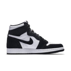 Nike Air Jordan 1 Retro High Twist (W) in black and white with suede and synthetic fur detailing.