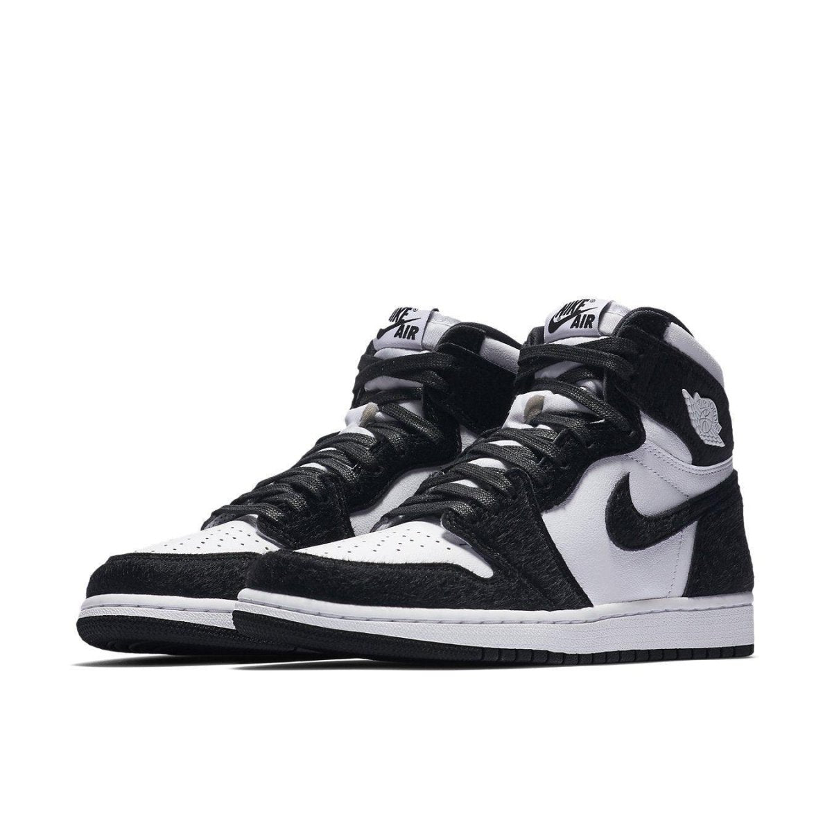 Nike Air Jordan 1 Retro High Twist Womens sneakers in black and white with suede and leather design.