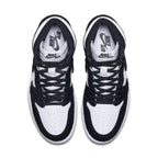 Top view of Jordan 1 Retro High Twist women's sneakers in black and white with smooth leather and suede details.