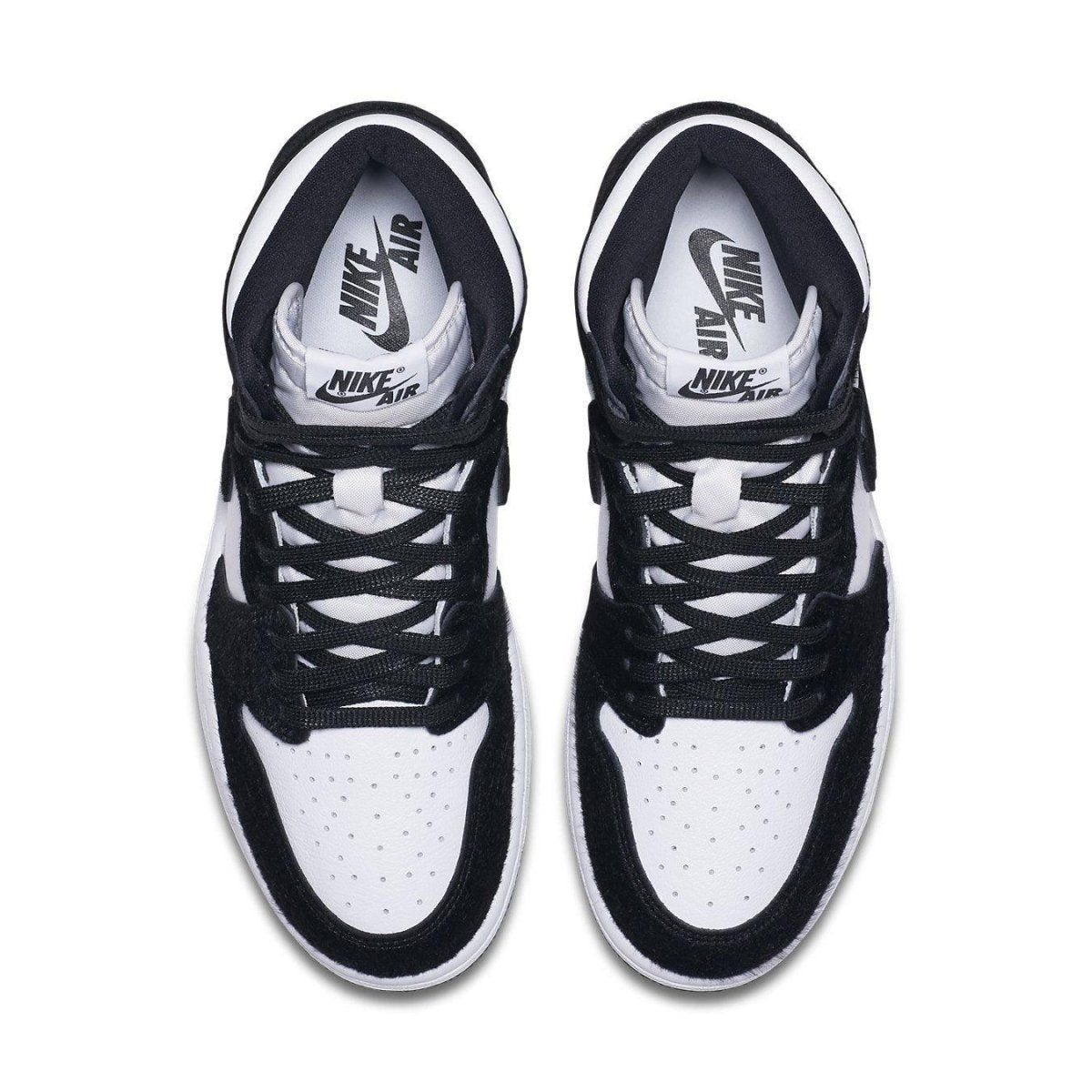 Top view of Jordan 1 Retro High Twist women's sneakers in black and white with smooth leather and suede details.