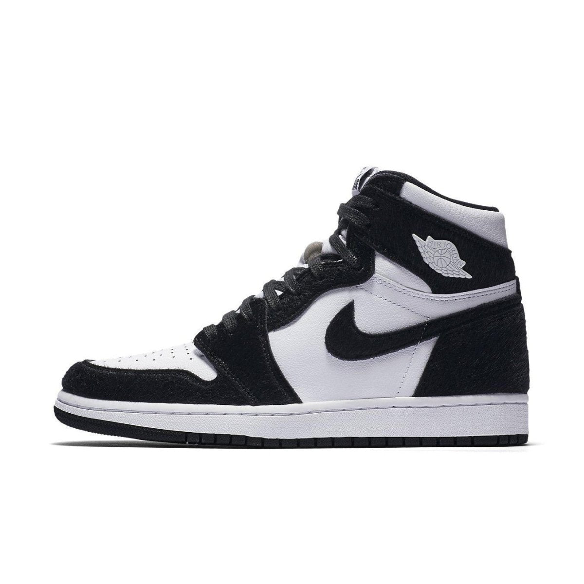Air Jordan 1 Retro High Twist Women's shoe in black and white featuring suede and synthetic fur details.