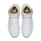 Nike Air Jordan 1 Retro LA top view showcasing white leather upper and beige lining with gold details.