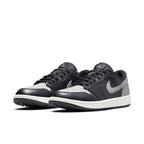 Jordan 1 Retro Low Golf Shadow sneakers in black and grey, featuring smooth leather upper and unique traction for grass.
