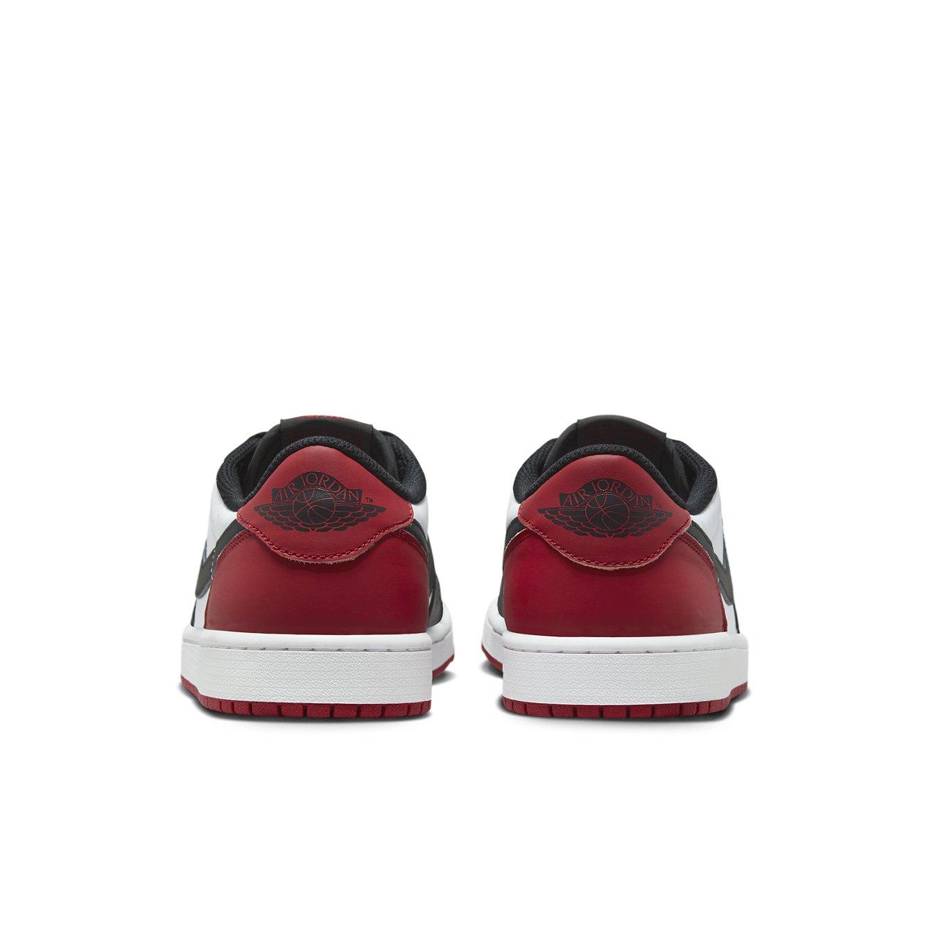 Rear view of Jordan 1 Retro Low OG Black Toe 2023 sneakers highlighting red and black colorway.