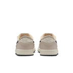 Air Jordan 1 Retro Low OG EX Coconut Milk rear view showcasing neutral tones and iconic logo.