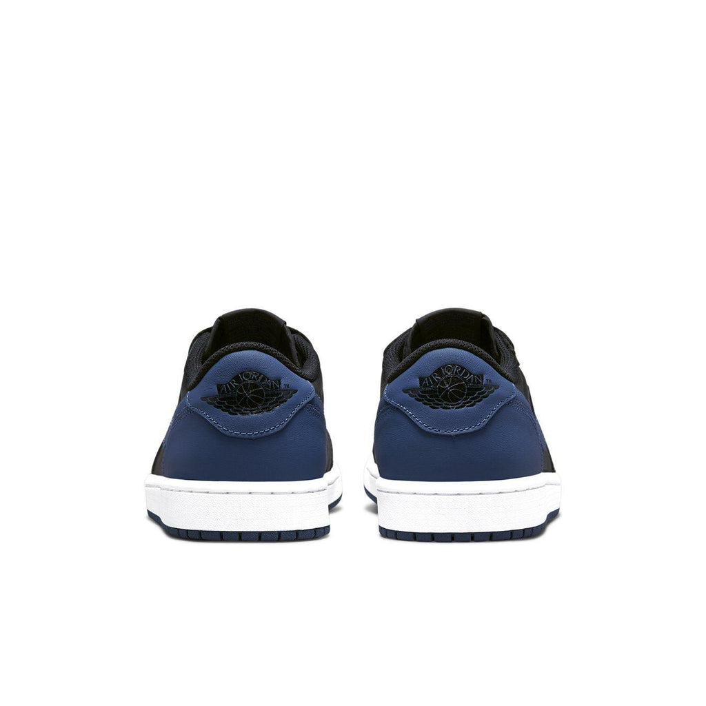 Rear view of Jordan 1 Retro Low OG Mystic Navy sneakers showcasing black and dark blue colorway.