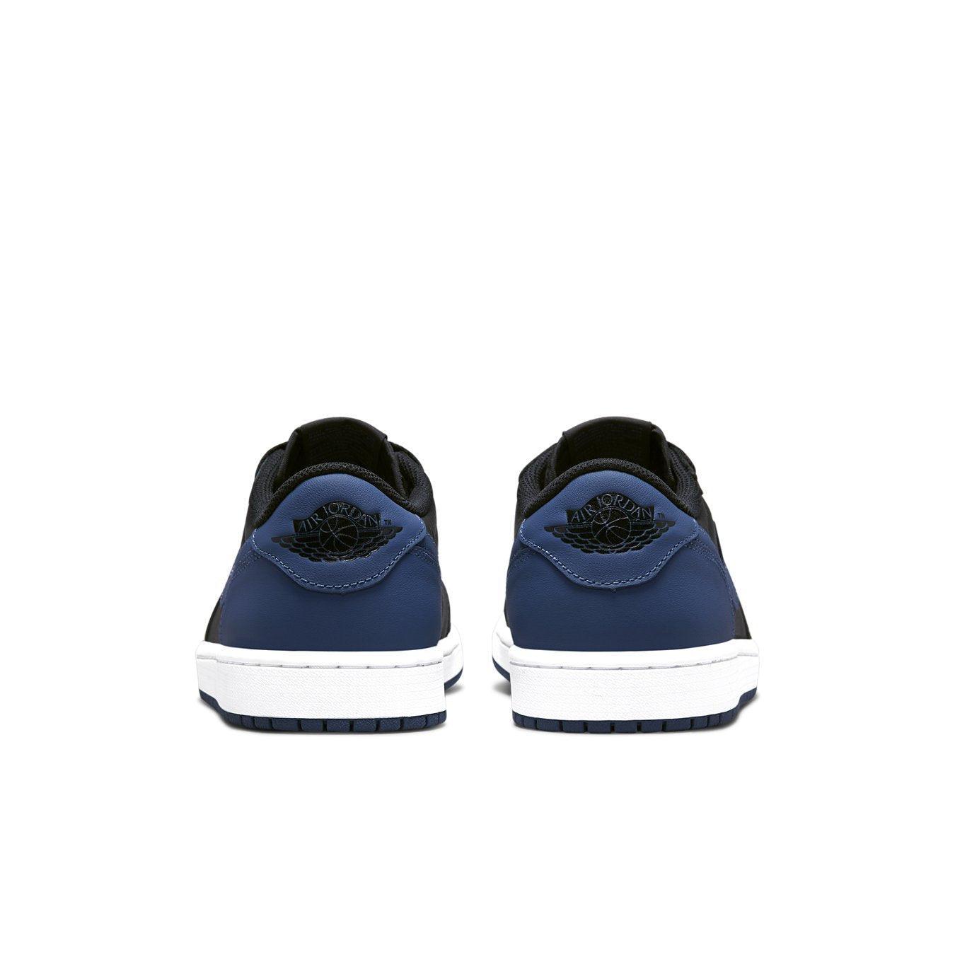 Rear view of Jordan 1 Retro Low OG Mystic Navy sneakers showcasing black and dark blue colorway.