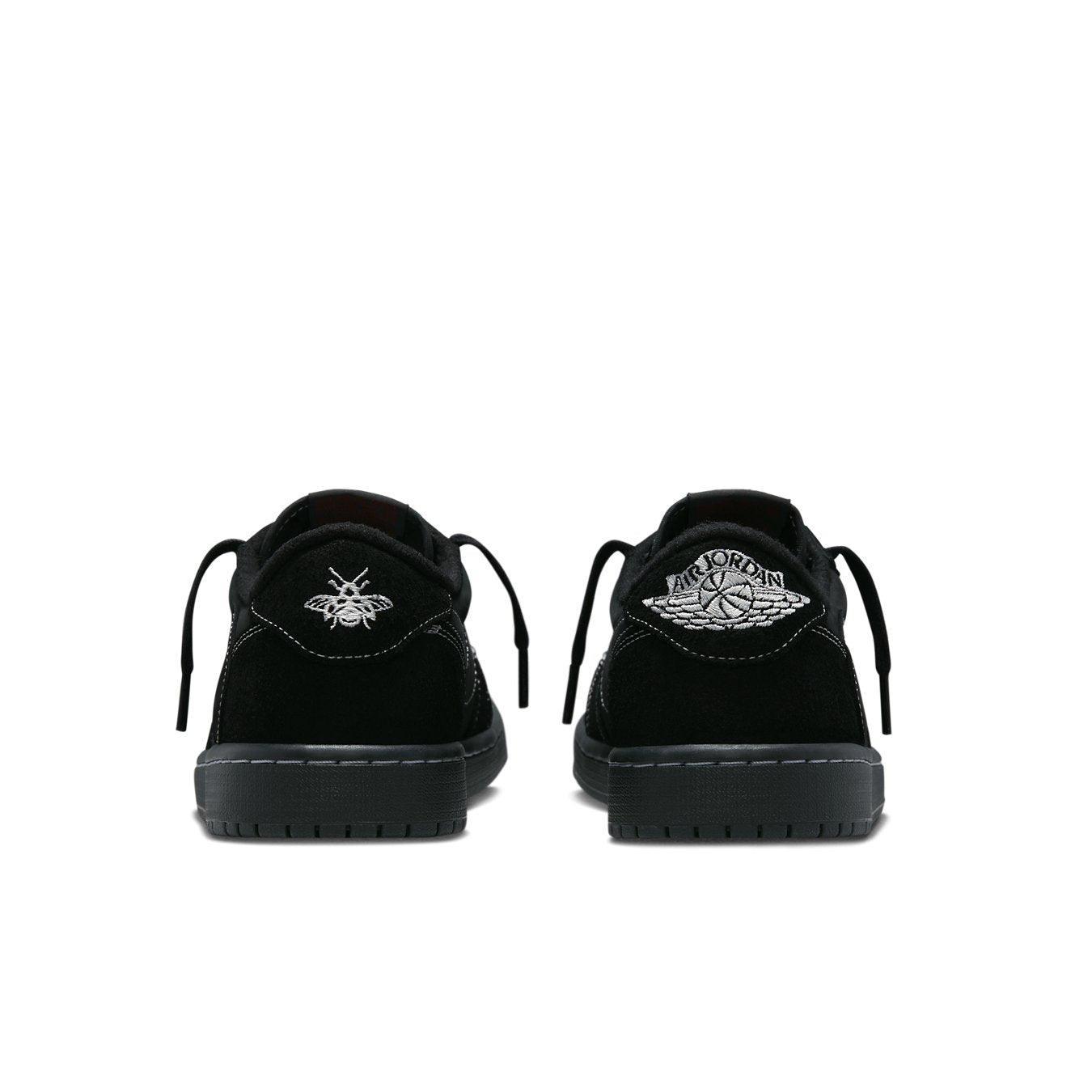 Air Jordan 1 Retro Low OG SP Travis Scott Black Phantom black suede sneakers rear view showcasing logo details.