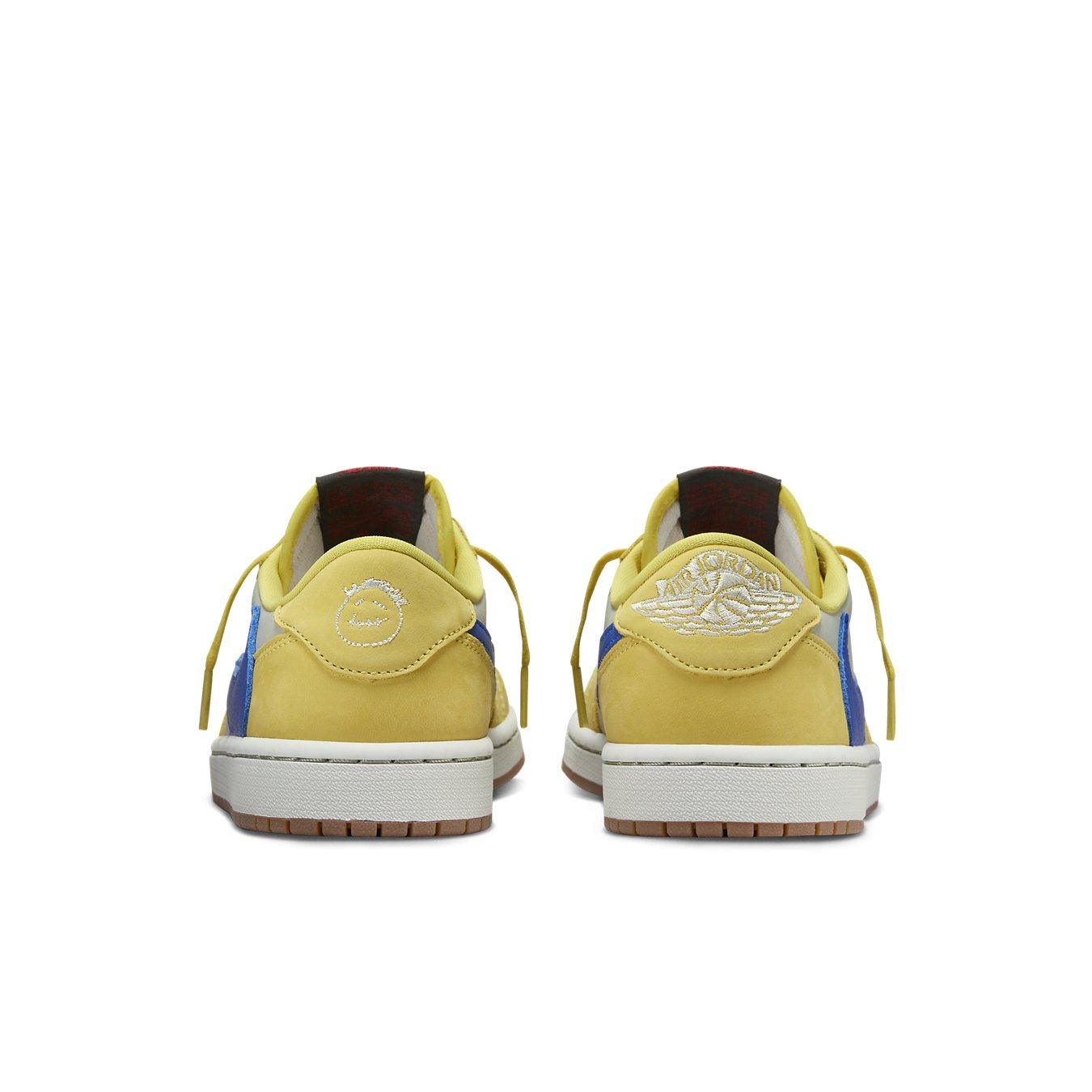 Rear view of Women's Air Jordan 1 Retro Low OG SP 'Travis Scott Canary' in yellow and blue, showcasing unique design.