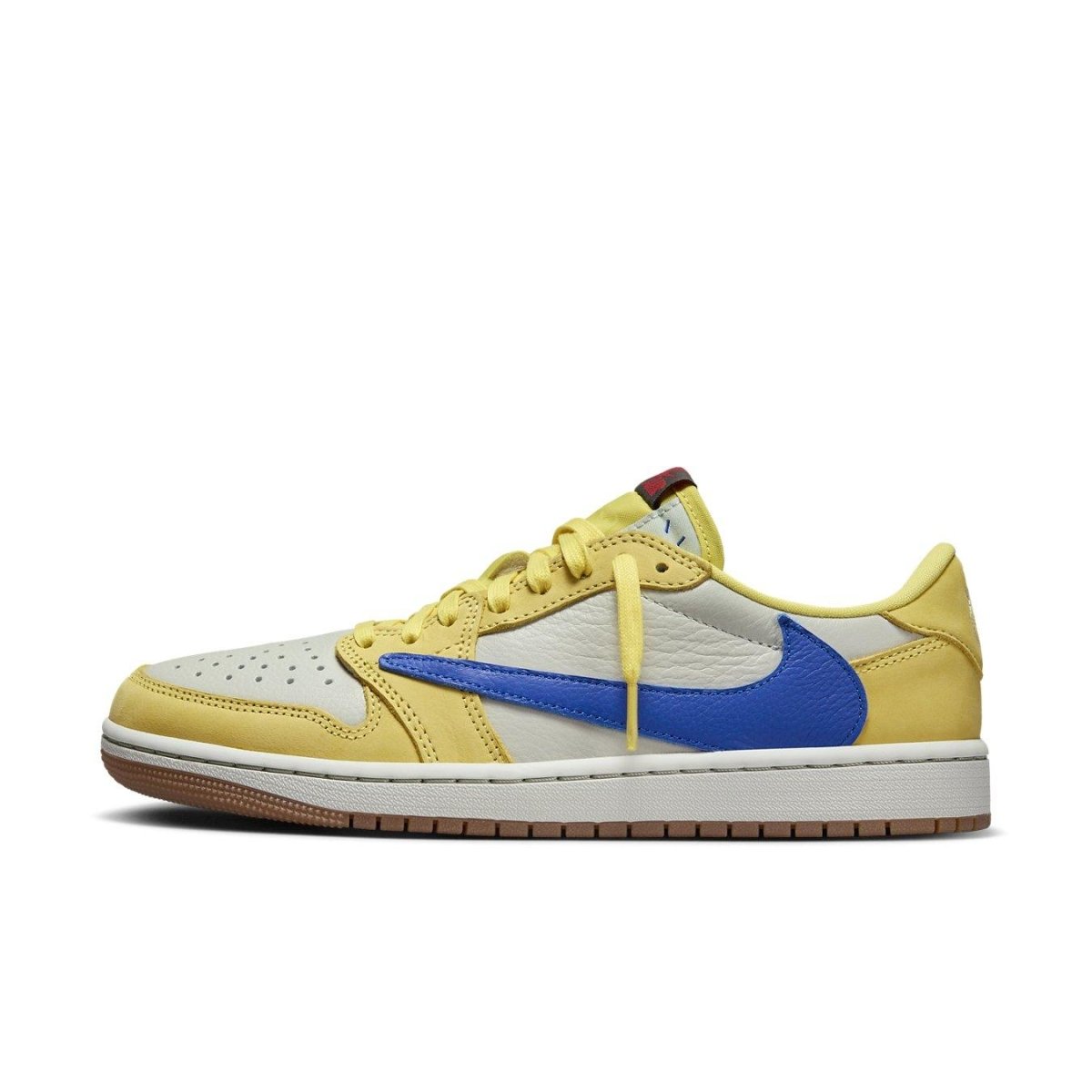 Women's Air Jordan 1 Retro Low OG SP Travis Scott Canary sneaker in yellow and Racer Blue.