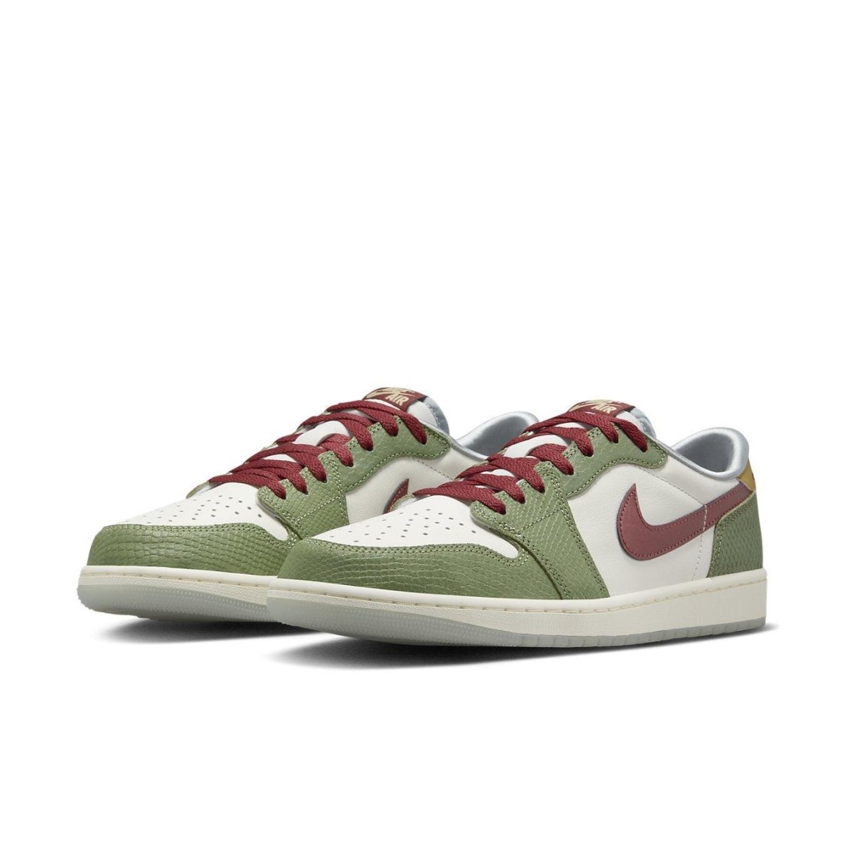 Jordan 1 Retro Low AJ1 sneaker in green and white with red accents and textured Swoosh logo.