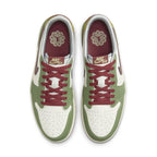 Top view of the Jordan 1 Retro Low OG Year of the Dragon sneaker featuring green and white colorway with maroon accents.