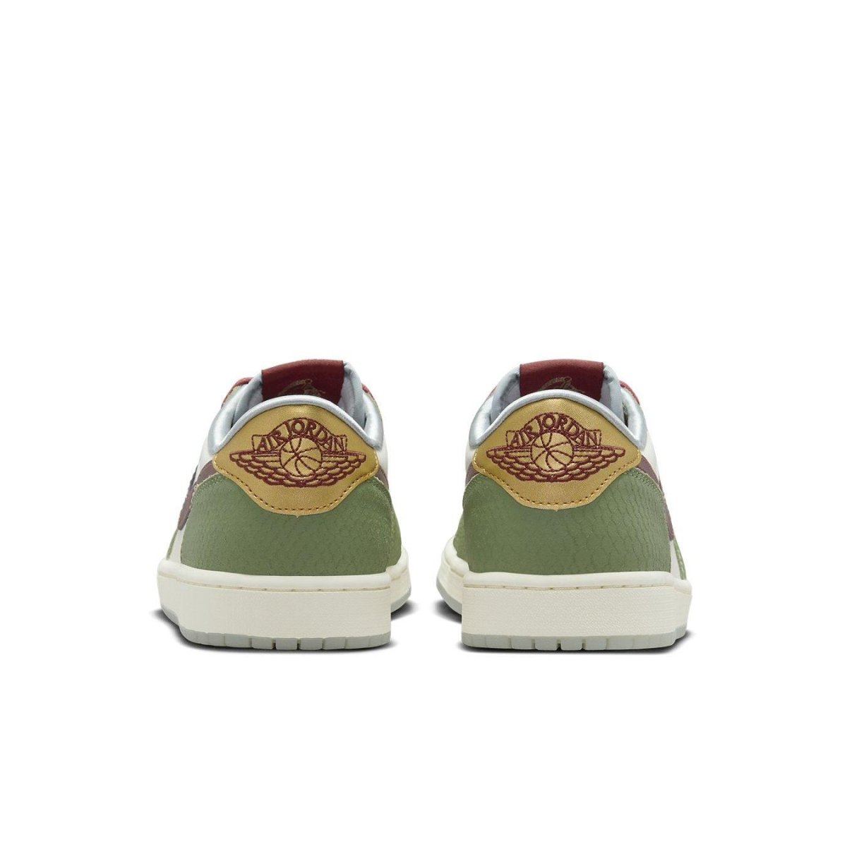 Jordan 1 Retro Low OG Year of the Dragon sneaker in green and maroon, featuring textured Swoosh and Jumpman logo.