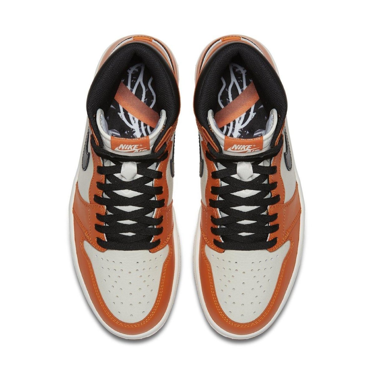 Air Jordan 1 Retro Reverse Shattered Backboard sneakers in orange, black, and white colorway from above.