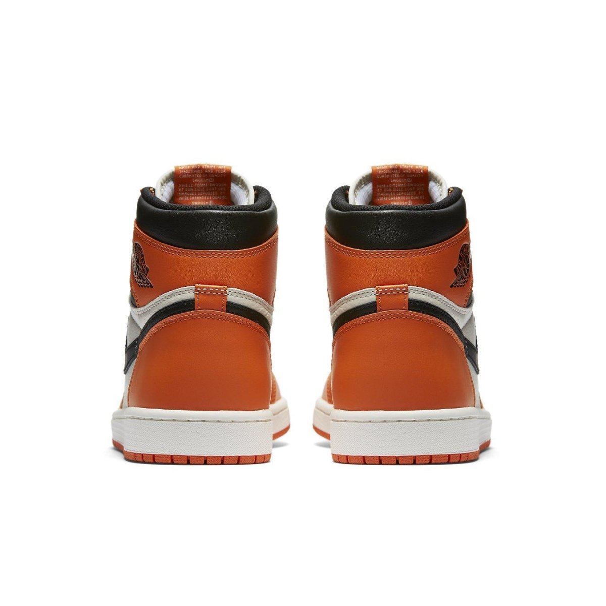 Back view of the Jordan 1 Retro Reverse Shattered Backboard sneakers in orange, black, and white.