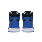Back view of Air Jordan 1 Retro Royal sneakers featuring blue and black colorway.