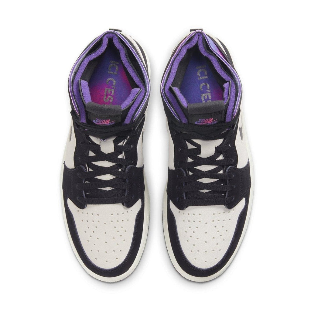 Top view of Jordan 1 Zoom Air CMFT PSG with black and white suede, purple accents, and iridescent details.