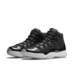 Jordan 11 Retro 72-10 sneakers in black leather and white sole, celebrating the 1995-96 NBA championship.