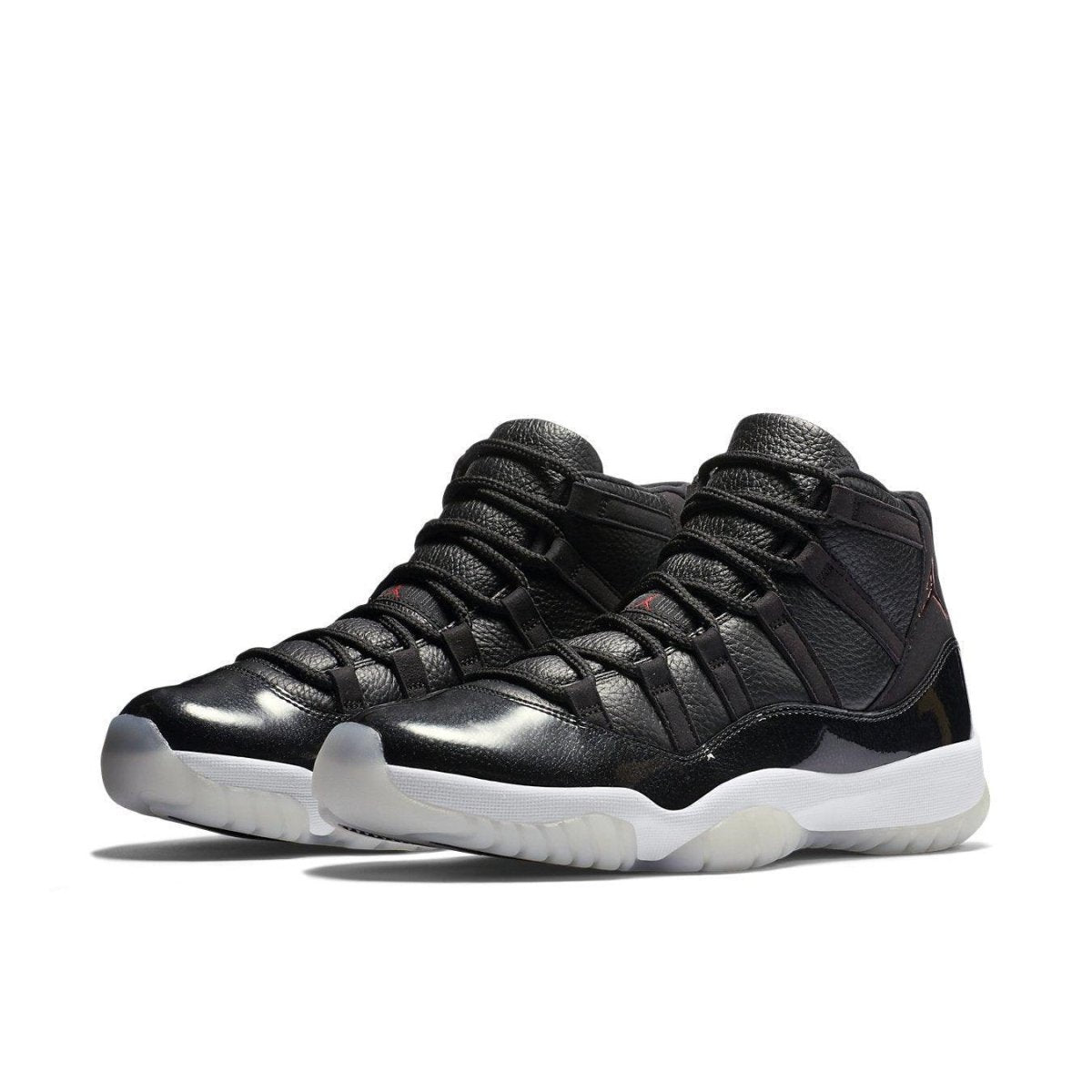 Jordan 11 Retro 72-10 sneakers in black leather and white sole, celebrating the 1995-96 NBA championship.