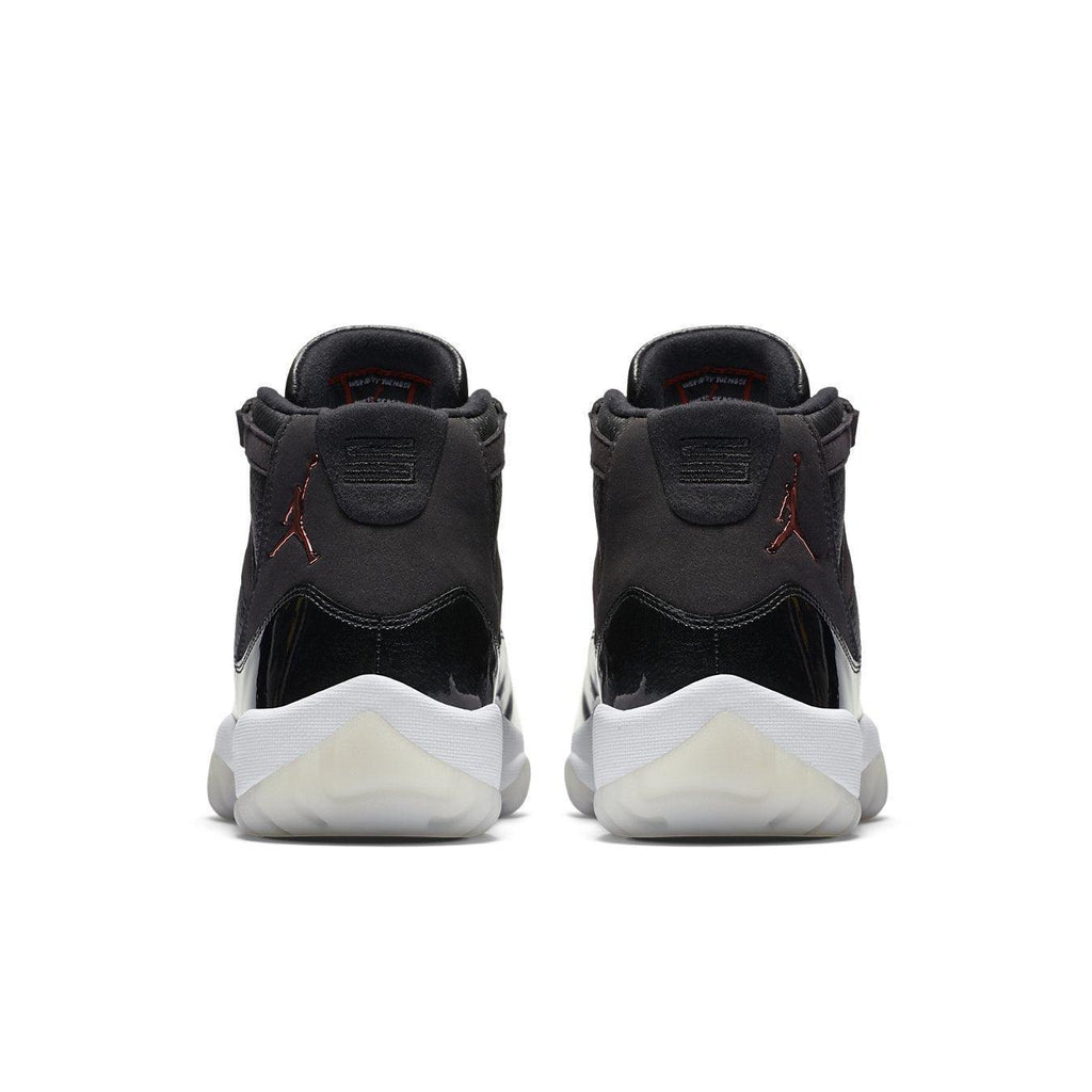 Retro Jordan 11 '72-10' sneakers featuring premium materials and a distinctive design, showcasing the back view.