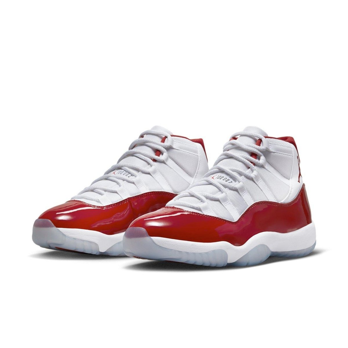 Air Jordan 11 Retro Cherry 2022 featuring red patent leather and white ballistic mesh upper.