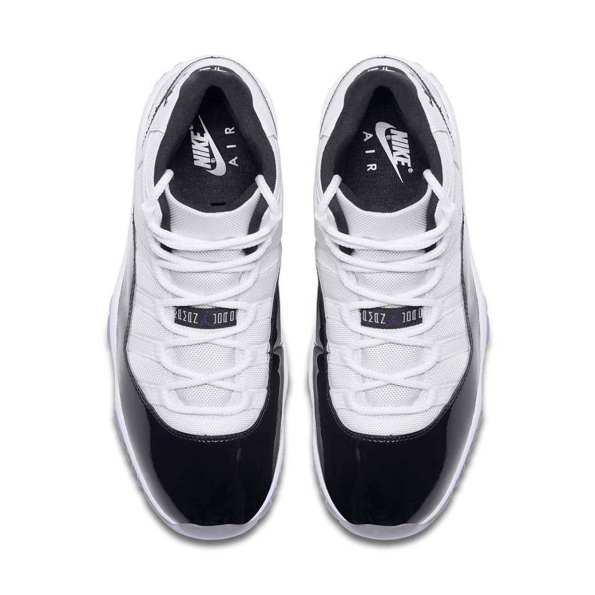 Jordan 11 Retro Concord 2018 sneakers featuring a black and white colorway with patent leather finish.