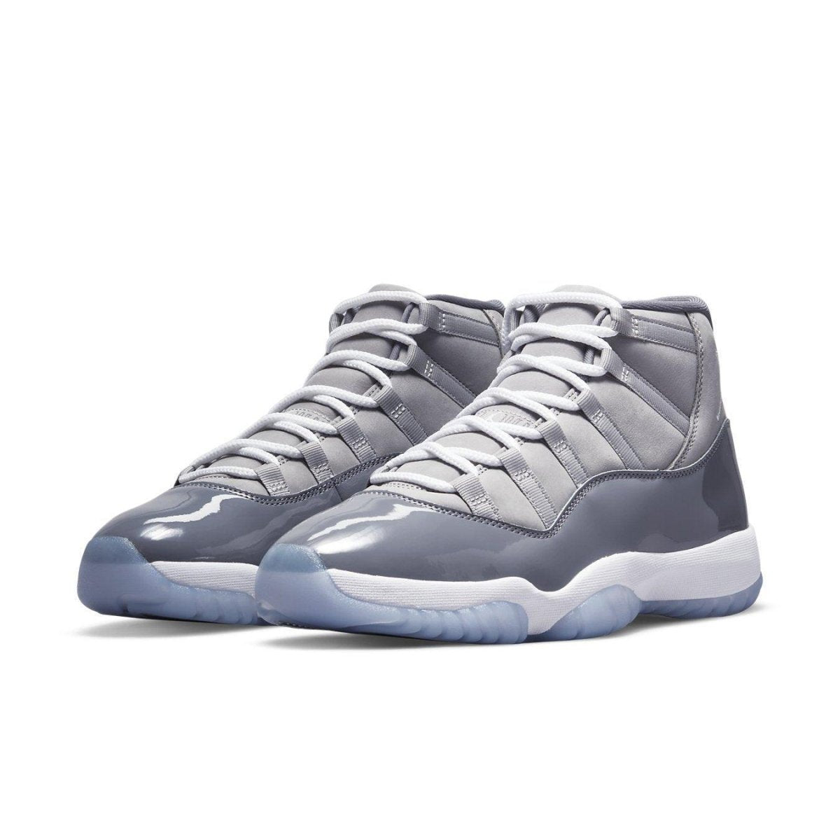 Air Jordan 11 Retro Cool Grey 2021 sneakers featuring grey nubuck and glossy patent leather accents.