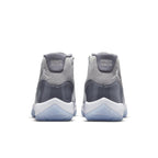 Rear view of Air Jordan 11 Retro Cool Grey (2021) showing sleek mid-top design and textured upper.
