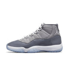 Jordan 11 Retro Cool Grey 2021 mid-top sneakers with grey nubuck and patent leather detailing.