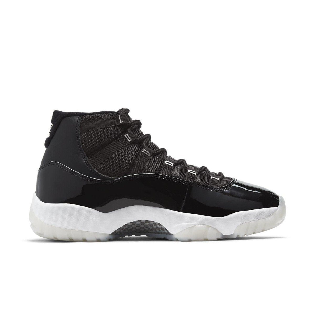 Air Jordan 11 Retro Jubilee 25th Anniversary in black and white, featuring a patent leather upper and iconic silhouette.