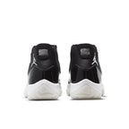 Air Jordan 11 Retro Jubilee 25th Anniversary, black and white sneakers, featuring metallic Jumpman logo.