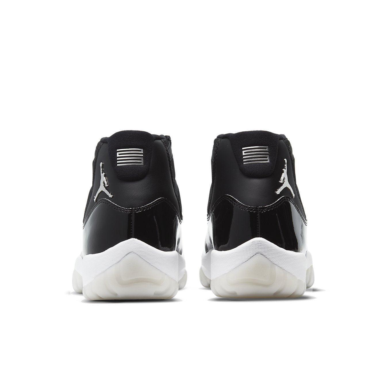 Air Jordan 11 Retro Jubilee 25th Anniversary, black and white sneakers, featuring metallic Jumpman logo.