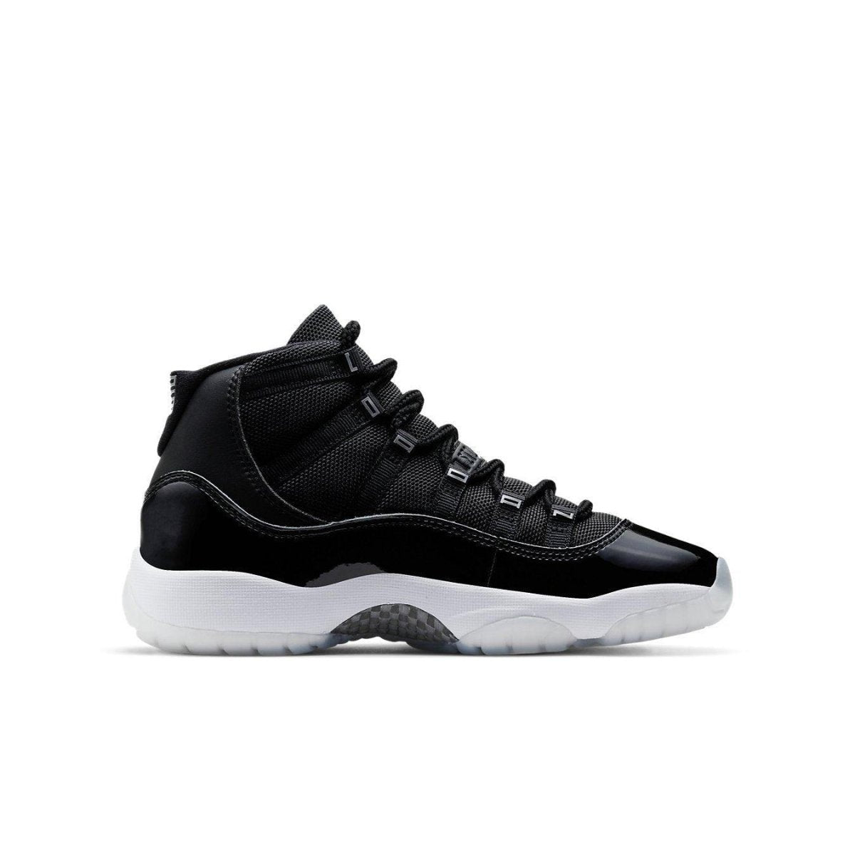 Jordan 11 Retro Jubilee (GS) in black and white with carbon fiber plate and patent leather finish.
