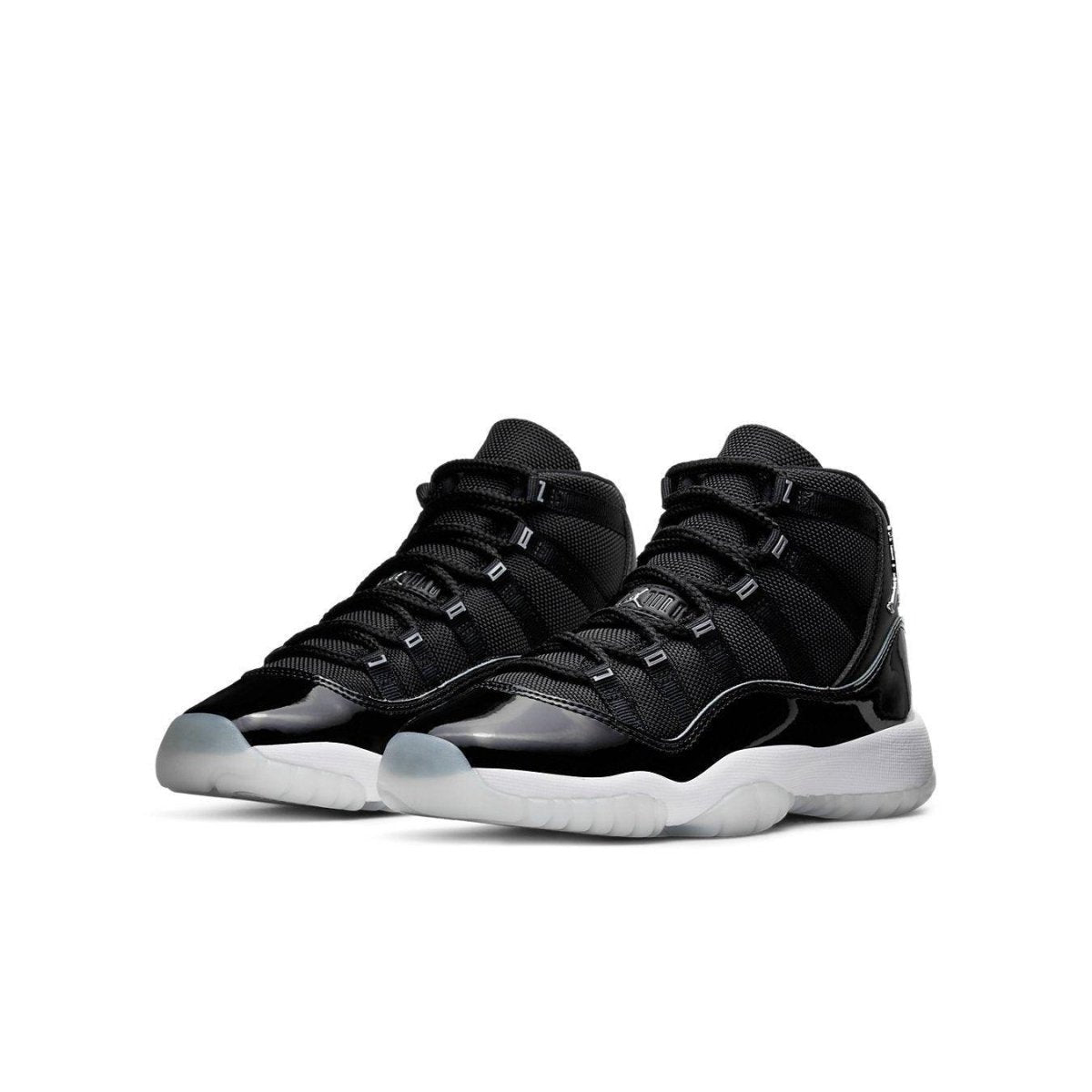 Jordan 11 Retro Jubilee (GS) sneakers featuring patent leather and carbon fiber detailing.
