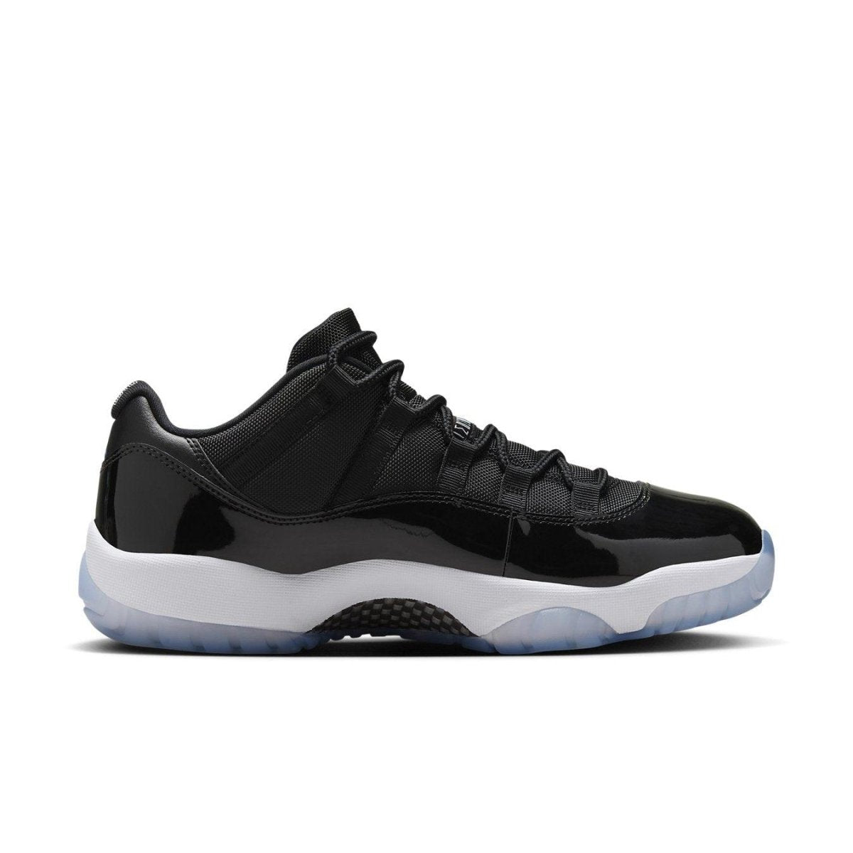 Air Jordan 11 Retro Low Space Jam with black ballistic mesh and shiny leather details.