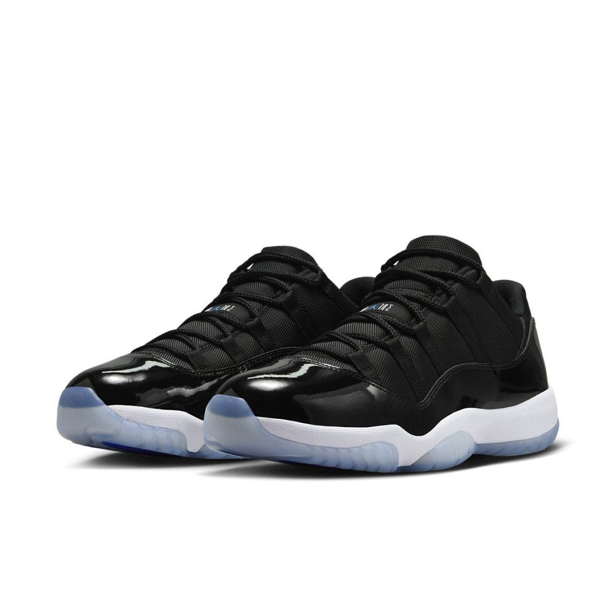 Air Jordan 11 Retro Low Space Jam in black mesh and patent leather with icy outsole, designed for style and comfort.