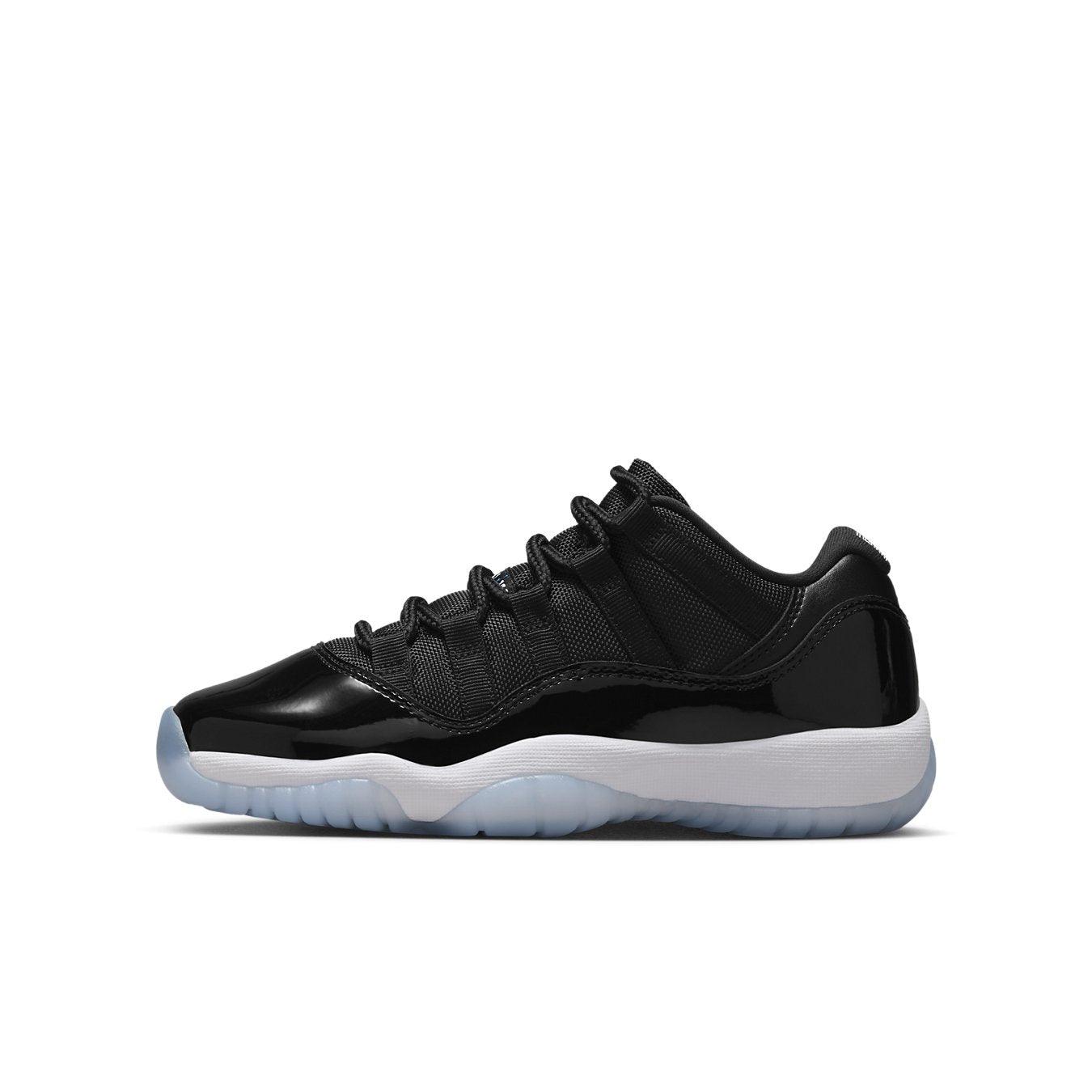 Air Jordan 11 Retro Low GS 'Space Jam' in black and white, featuring mesh and patent leather design.