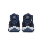 Rear view of women's Jordan 11 Retro Midnight Navy shoes showcasing premium suede and rubber outsole.