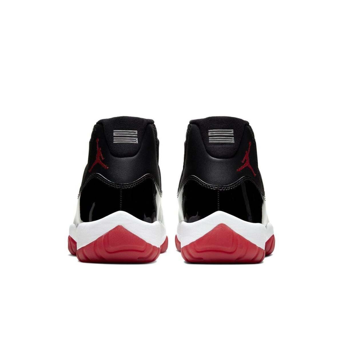 Back view of Air Jordan 11 Retro Bred 2019 sneakers showcasing black, red, and white color scheme.