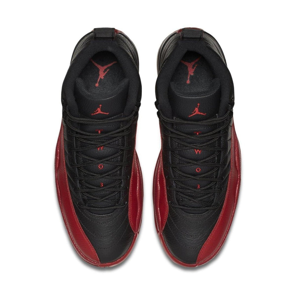 Air Jordan 12 Retro Flu Game 2016 top view featuring black and red colorway and iconic Jumpman logo.