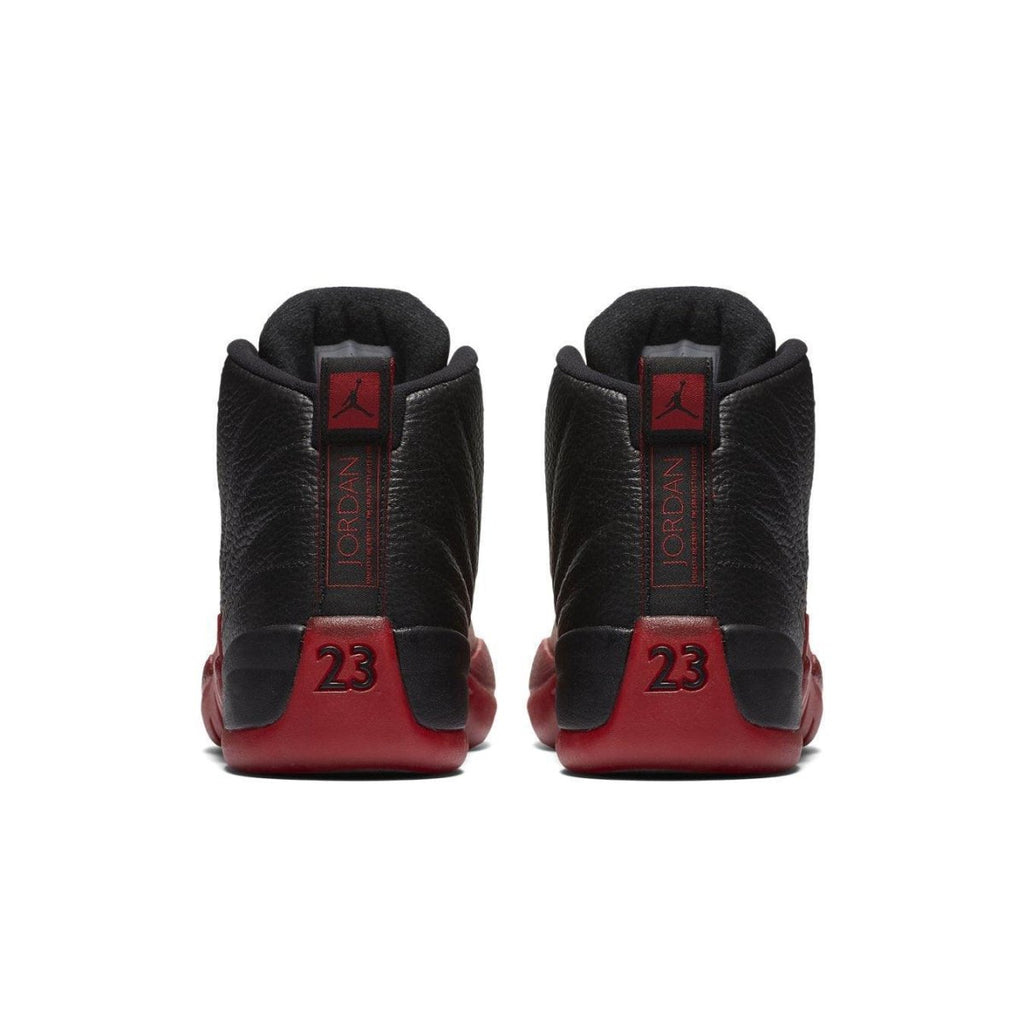 Rear view of the Air Jordan 12 Retro 'Flu Game' 2016 with black and red colorway, featuring iconic 23.