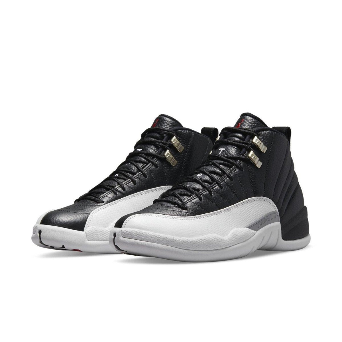 Jordan 12 Retro Playoffs 2022 sneaker in black and white with textured overlays and silver eyelets.