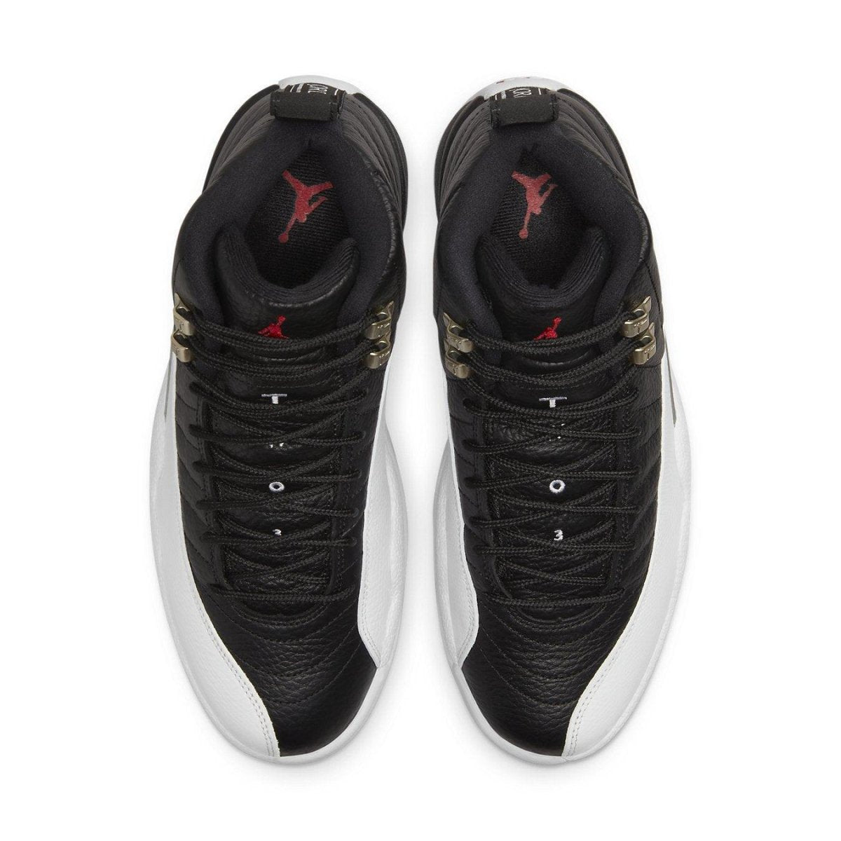 Air Jordan 12 Retro Playoffs 2022 sneakers, featuring black leather upper and white lizard texture overlays.