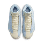Air Jordan 13 Retro SoleFly in light blue and cream colorway with unique textures and laces from overhead view.